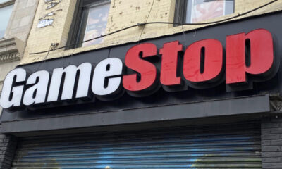 A fluctuating stock market chart showing the dramatic rise and fall of GameStop (GME) stock prices.