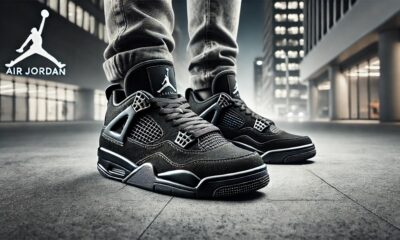 Air Jordan Black Cat 4s sneakers displayed in a modern, stylish setting with a sleek and urban background.