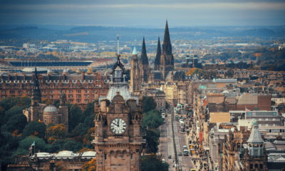 A picturesque view of Edinburgh Castle and the city skyline during a sunny day.